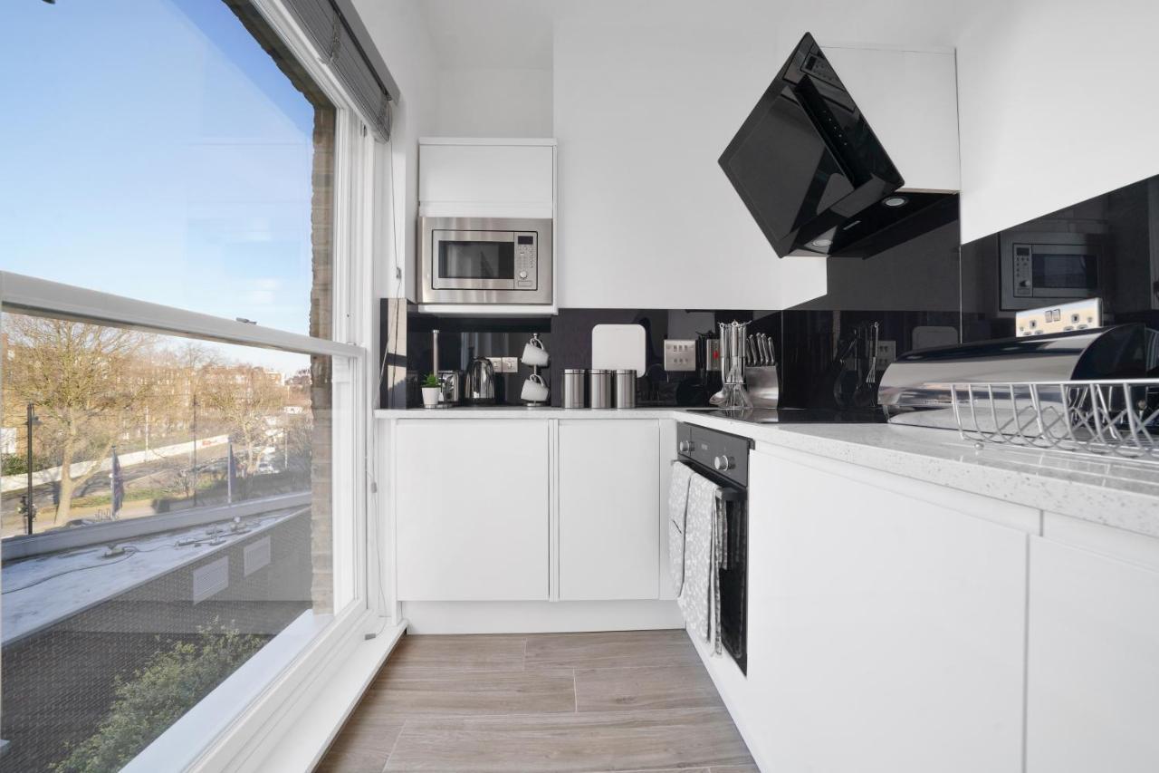 City Prime Apartments Londyn Zewnętrze zdjęcie A typical kitchen in a serviced apartment