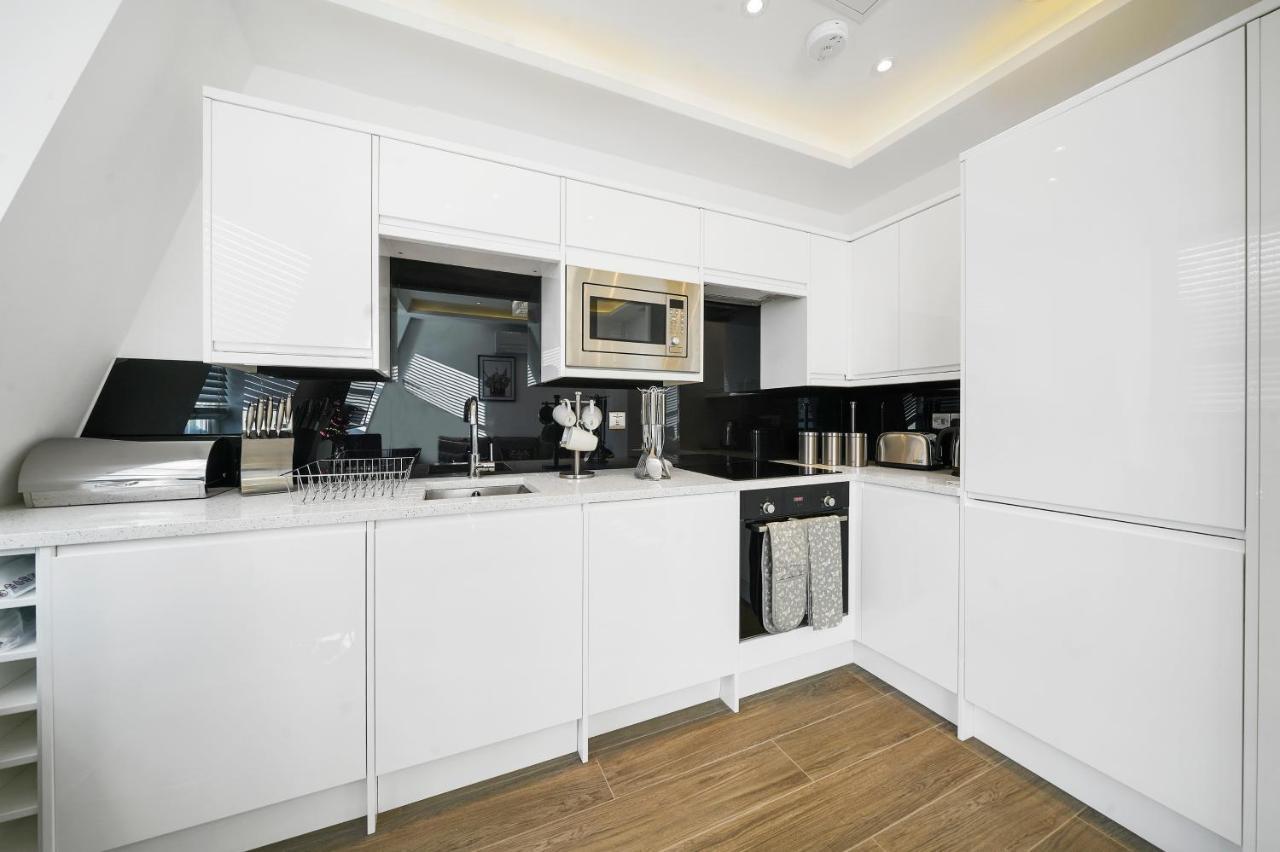 City Prime Apartments Londyn Zewnętrze zdjęcie A modern kitchen